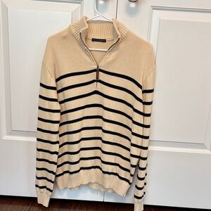 Brandy Melville black and beige striped quarter zip sweater.
